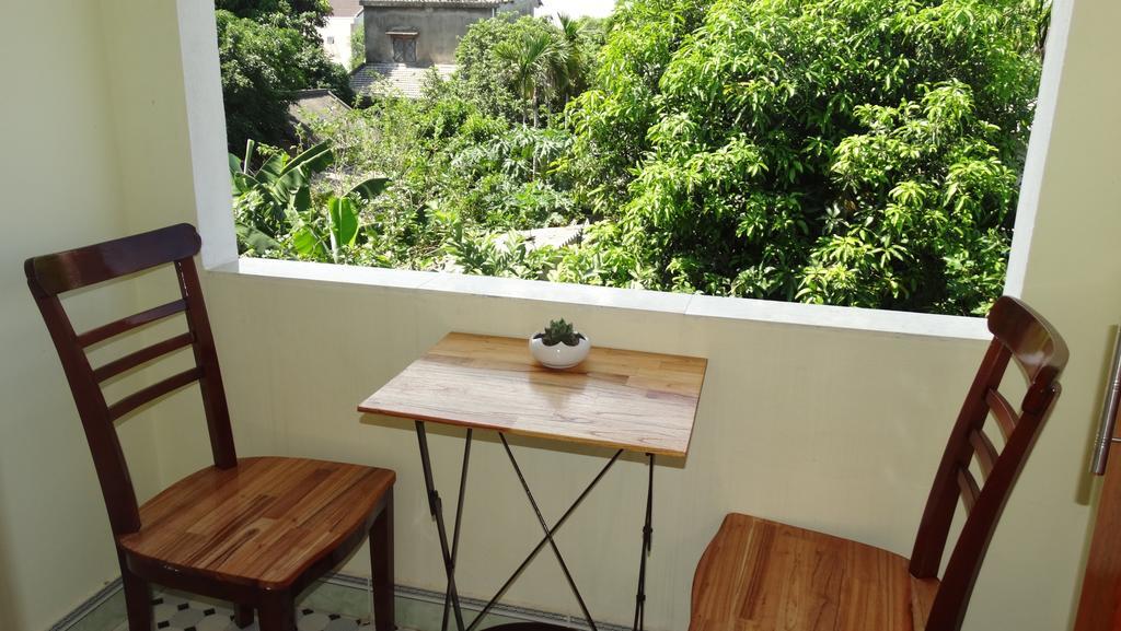 Yellow House Homestay Хойан Номер фото